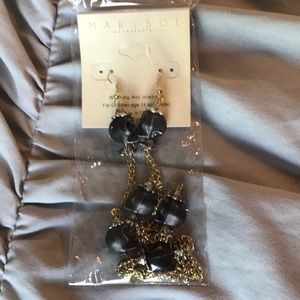 Costume skull dangle earrings NWOT sealed package